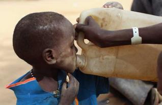 august2011_child_drinking_1956647i_903308289